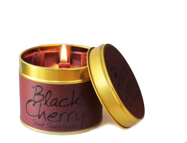 Black Cherry scented tin candle by Lily-Flame with black cherry fragrance and decorative label in a small metal container.