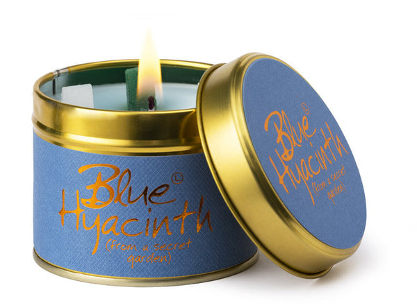 Blue hyacinth scented tin candle by Lily-Flame, showing a decorative blue candle in a metal tin with hyacinth floral design.