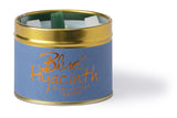 Blue Hyacinth scented tin candle by Lily-Flame with a decorative label and a lit wick, ideal for home fragrance.