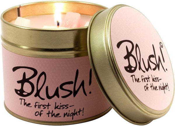 Lily-Flame blush scented tin candle with floral design, showing the candle inside the decorative metal tin.