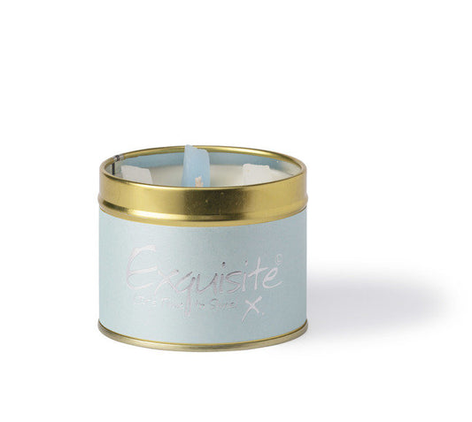 Lily-Flame scented tin candle with a decorative label, featuring a warm, inviting design suitable for home decor.
