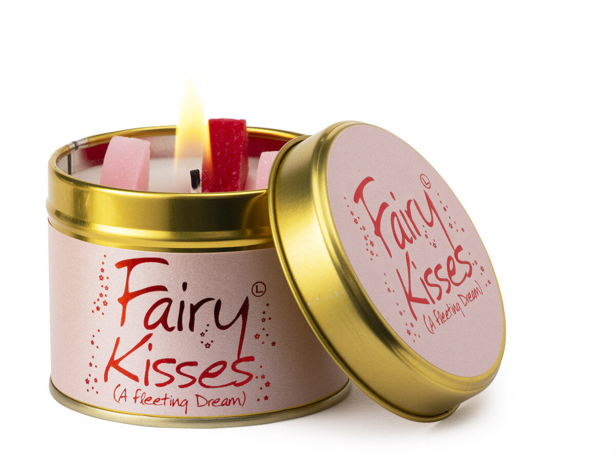 Lily-Flame Fairy Kisses scented tin candle with floral design and a soft glow, perfect for adding charm and fragrance to a space.