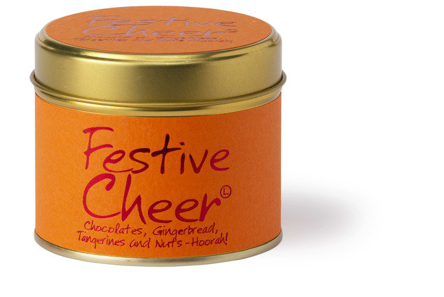 Lily-Flame Festive Cheer scented tin candle with holiday-themed design and warm, inviting glow.