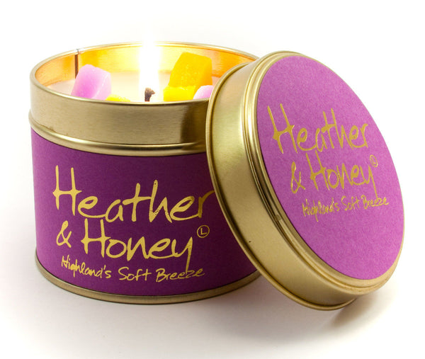 Heather and Honey scented tin candle by Lily-Flame with a decorative label and warm, inviting design.
