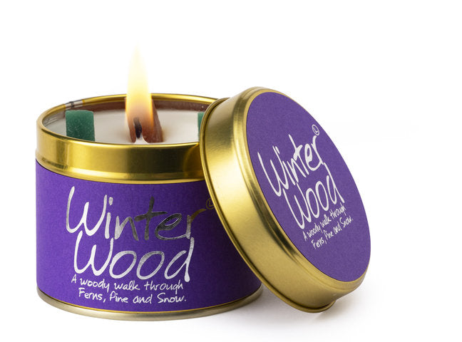 Winter Wood scented tin candle by Lily-Flame with a rustic design and natural wood-inspired label, perfect for cozy winter ambiance.