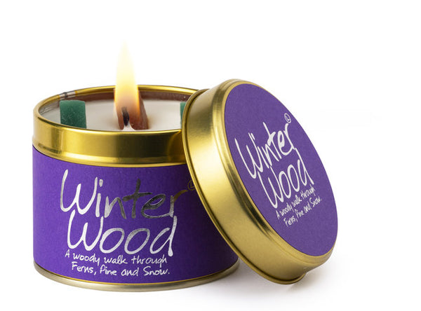 Winter Wood scented tin candle by Lily-Flame with a rustic design and natural wood-inspired label, perfect for cozy winter ambiance.