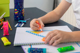 Set of four Maped Pixel Party mini highlighters with colorful caps and chisel tips for vibrant highlighting.