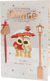 Boofles stood in the snow with an umbella-Fiance (300)