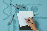 Set of four Oxford Helix Oxford Monochrome Gel Black Ink Pens with sleek black design and comfortable grip.