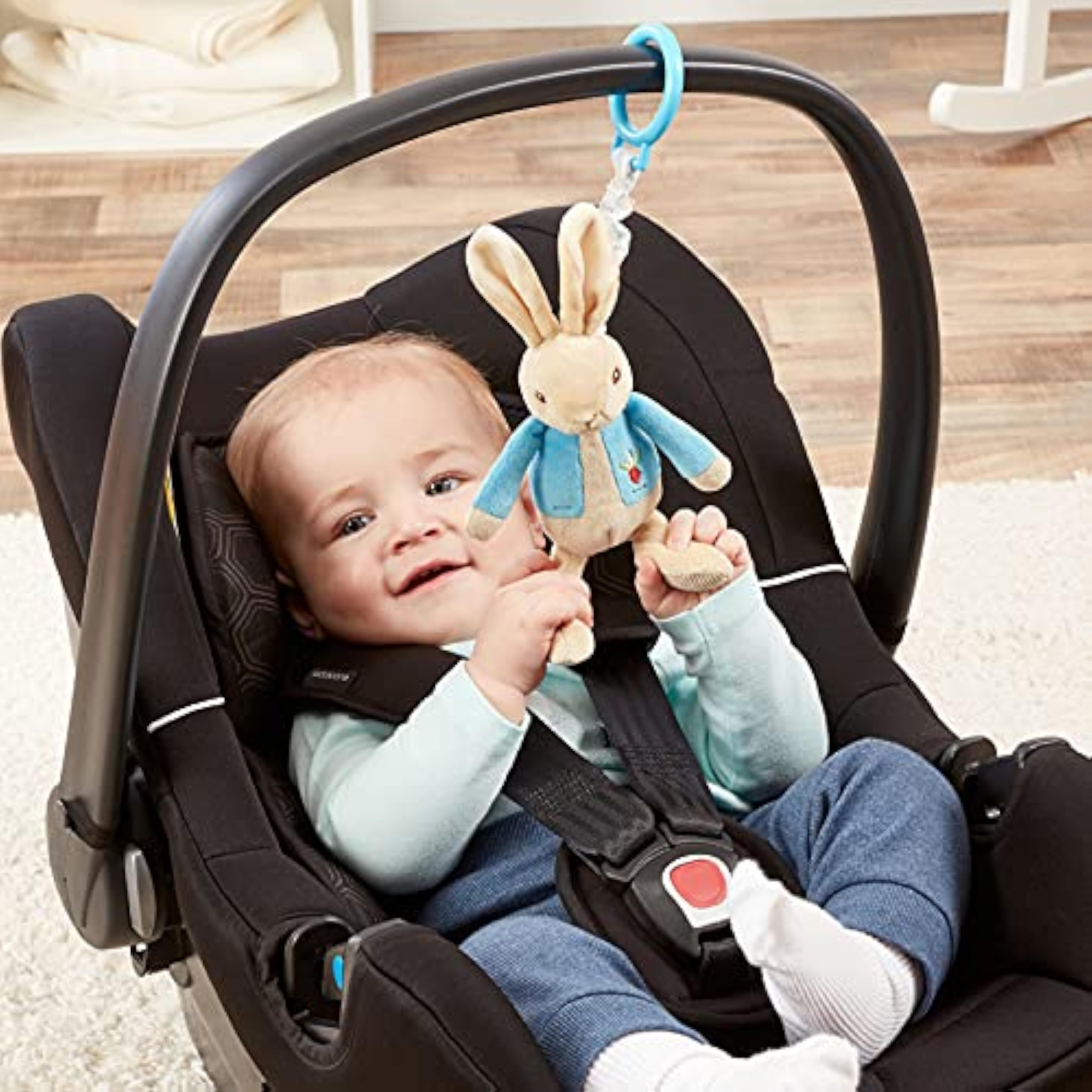 Rainbow Designs Peter Rabbit jiggle attachable soft toy for babies and toddlers, featuring colorful rainbow accents and a plush texture.