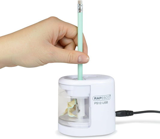 Rapesco 1448 PS12-USB electric pencil sharpener in white with USB charging port and power switch, shown with sharpened pencil.