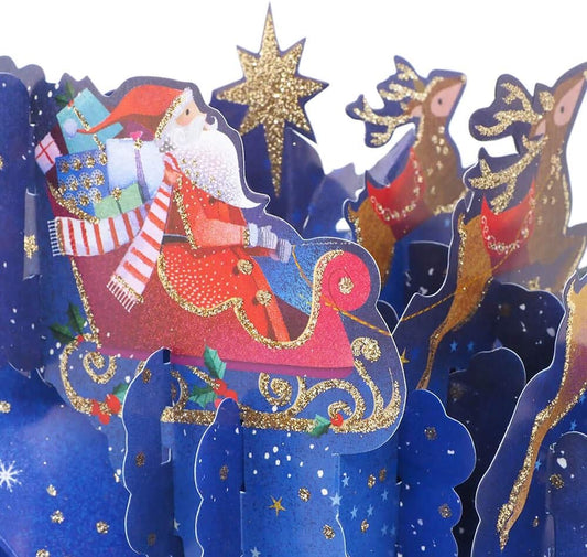 3D pop-up Santa and sleigh Christmas greeting card by Second Nature, featuring festive holiday scene and intricate paper design.