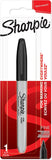 Sharpie black permanent marker fine point used for decorating greeting cards, with the marker cap and tip visible.