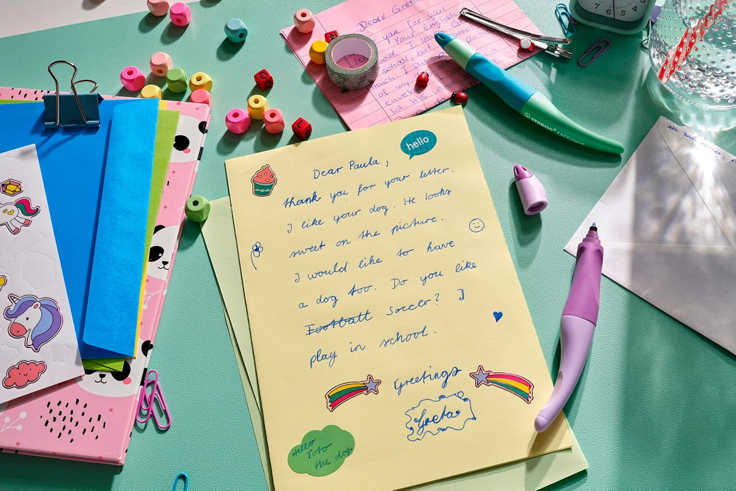 Stabilo EASYoriginal Pastel ergonomic rollerball pen in cloudy blue for left-handed writers, featuring a comfortable grip.