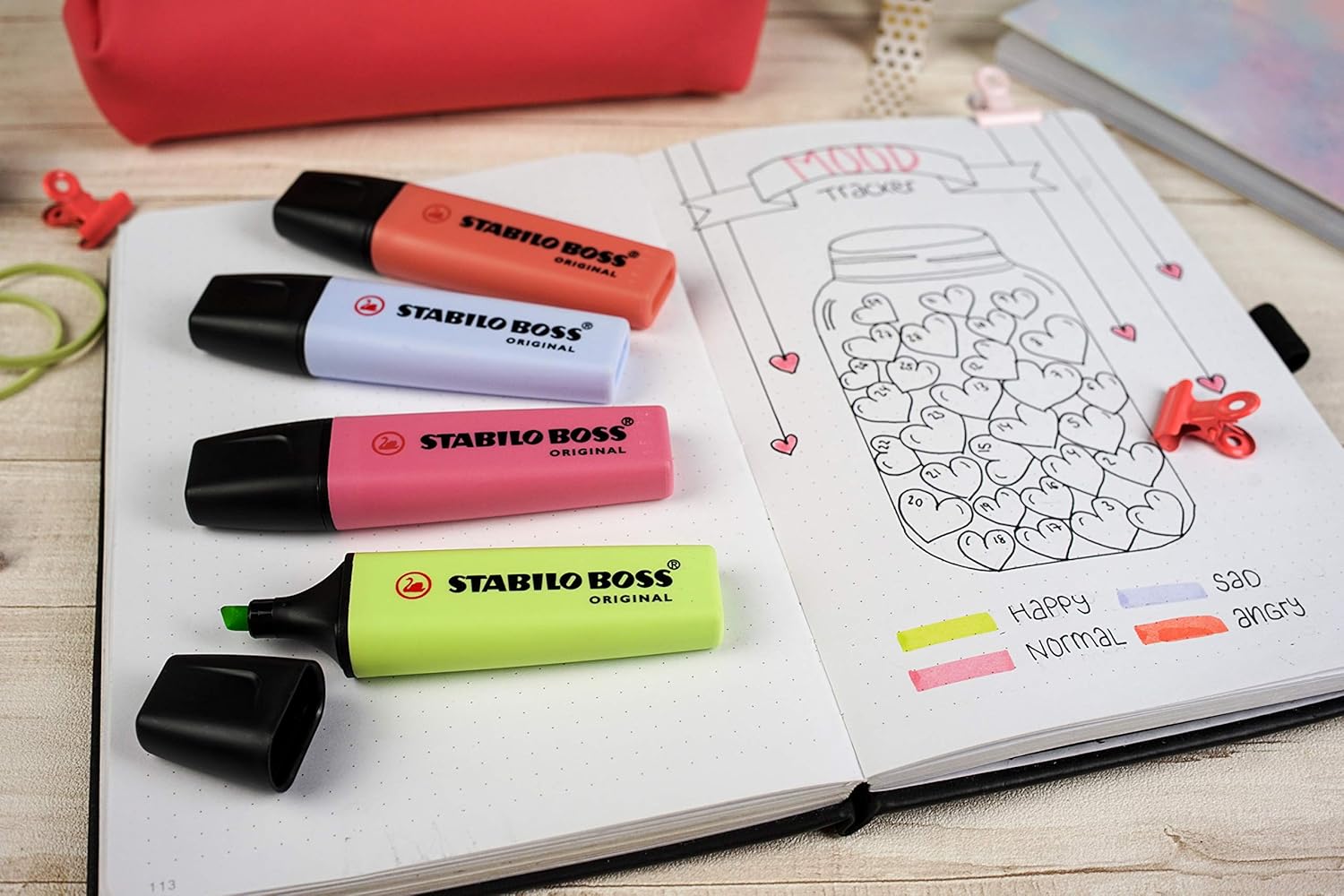 Stabilo BOSS ORIGINAL Pastel highlighter in cherry blossom pink with chisel tip, showing the pastel pink ink and sleek design.