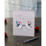 UK Greetings Christmas Card for Sister and Brother-in-Law - Ice Skating Penguins Design