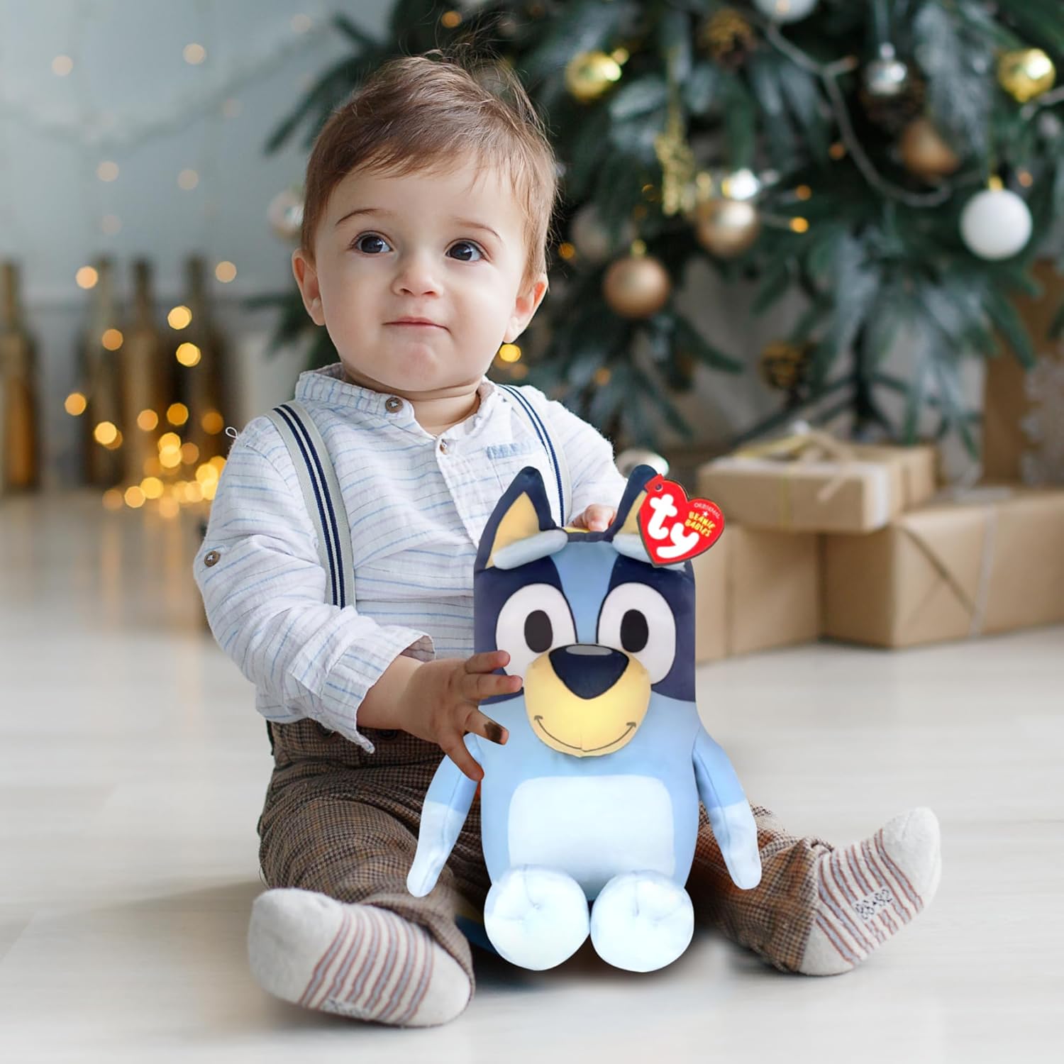 TY Bluey Bingo plush toy, soft teddy bear collectible for kids, featuring bright blue fur and cuddly design.