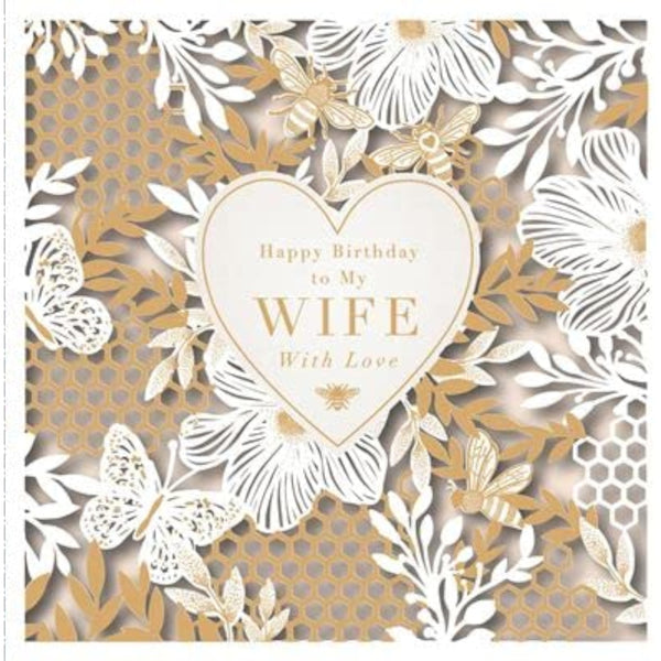 Bees, butterflies, and flowers with die-cut detail finish on a UK Greetings birthday card featuring a floral design.