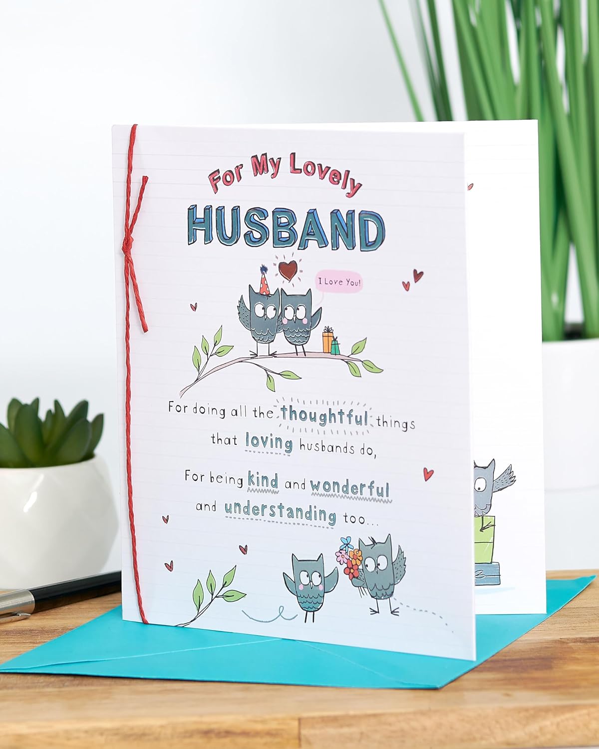 Elegant birthday card for husband with heartfelt design, featuring a romantic message and decorative elements from UK Greetings.