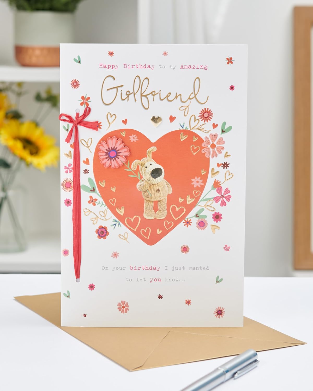 Cute Boofle birthday card for girlfriend with colorful floral design, featuring a cheerful cartoon dog illustration.