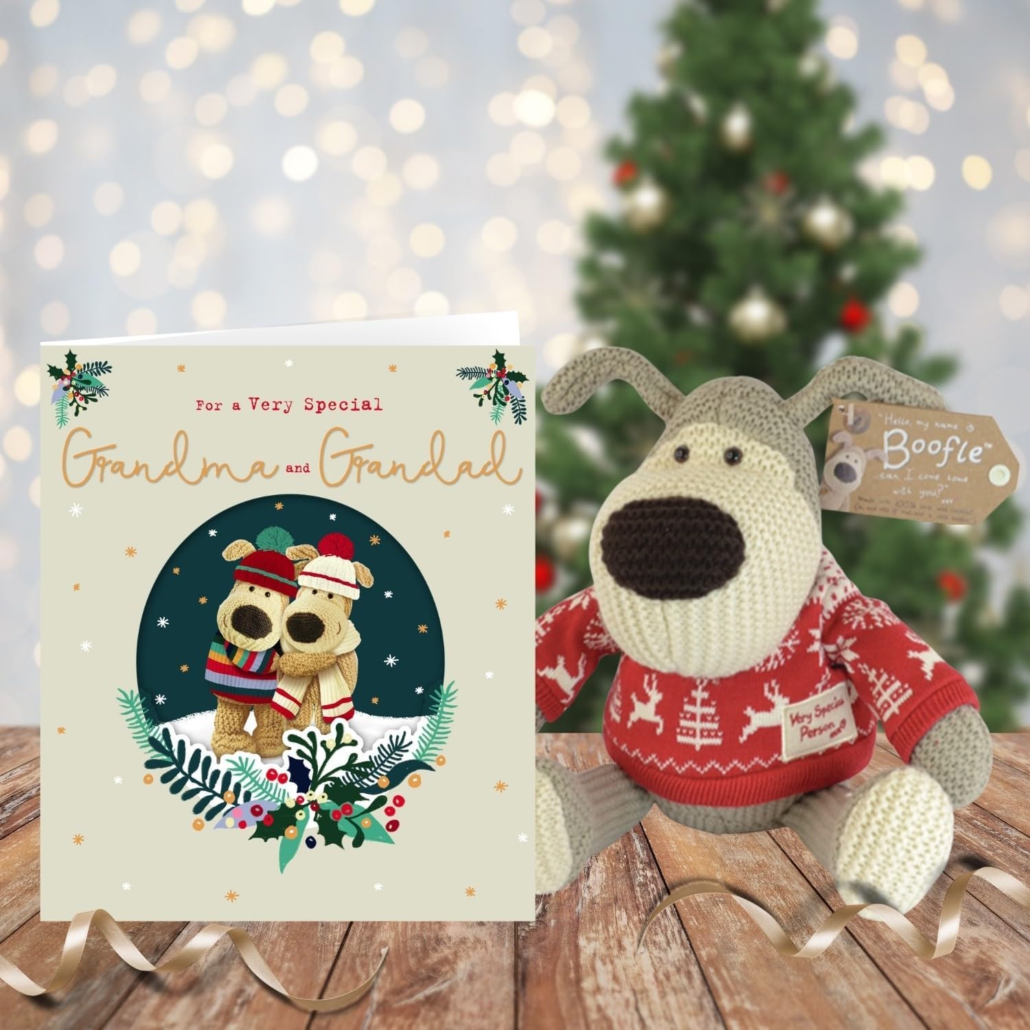 Boofle Grandma & Grandad Christmas card featuring a cute illustrated dog with a festive background by UK Greetings.