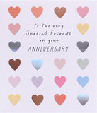 Colorful hearts design anniversary card for friends, featuring bright, loving greeting from UK Greetings.
