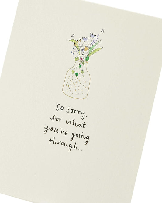UK Greetings sympathy card featuring comforting words and an elegant design for expressing condolences.