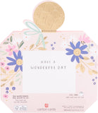 UK Greetings birthday card for daughter featuring a perfume bottle-shaped design with colorful floral accents.