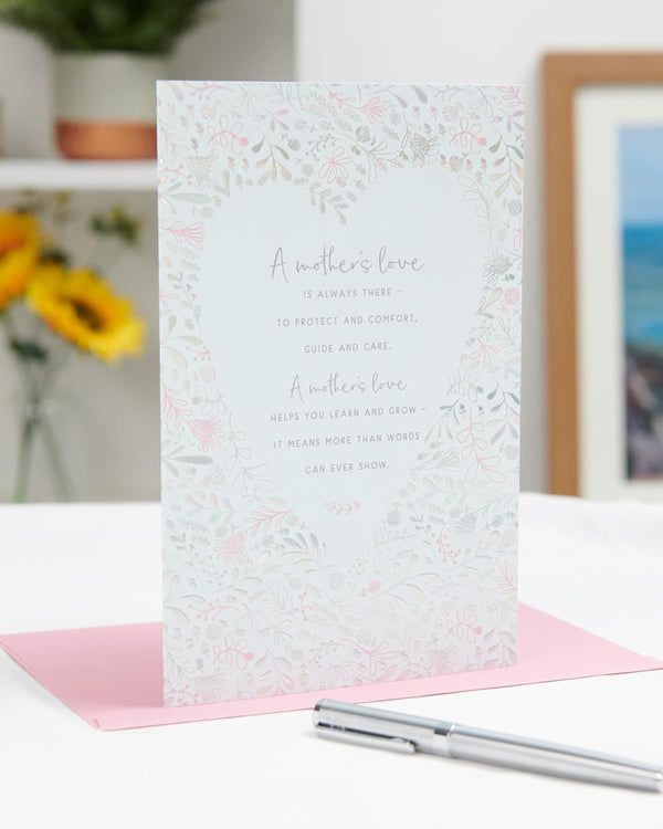 UK Greetings birthday card for mum featuring a Mother's Love design, with colorful floral illustrations and heartfelt message inside.