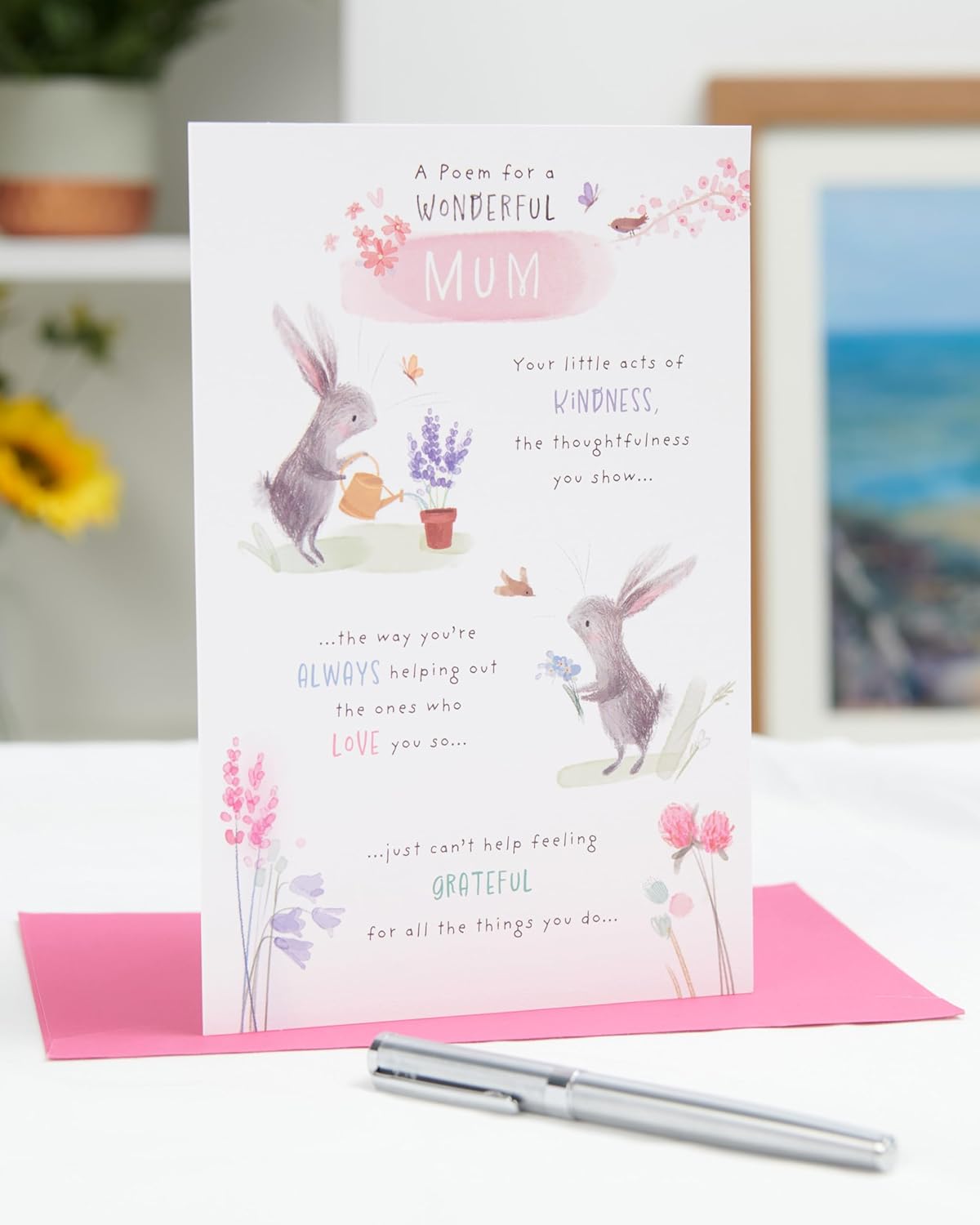 UK Greetings birthday card for mum with a wonderful poem design, featuring colorful floral illustrations and heartfelt message.