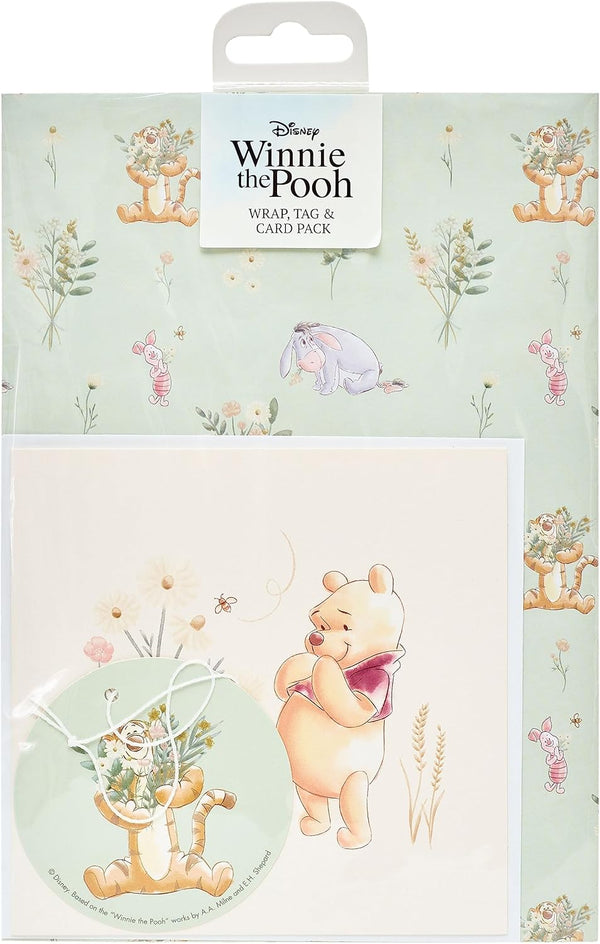 UK Greetings Disney Winnie the Pooh gift wrap, greeting card, and tag pack featuring colorful Pooh-themed designs.