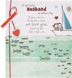 UK Greetings Father's Day card for husband featuring a sweet design, with colorful illustrations and heartfelt message.