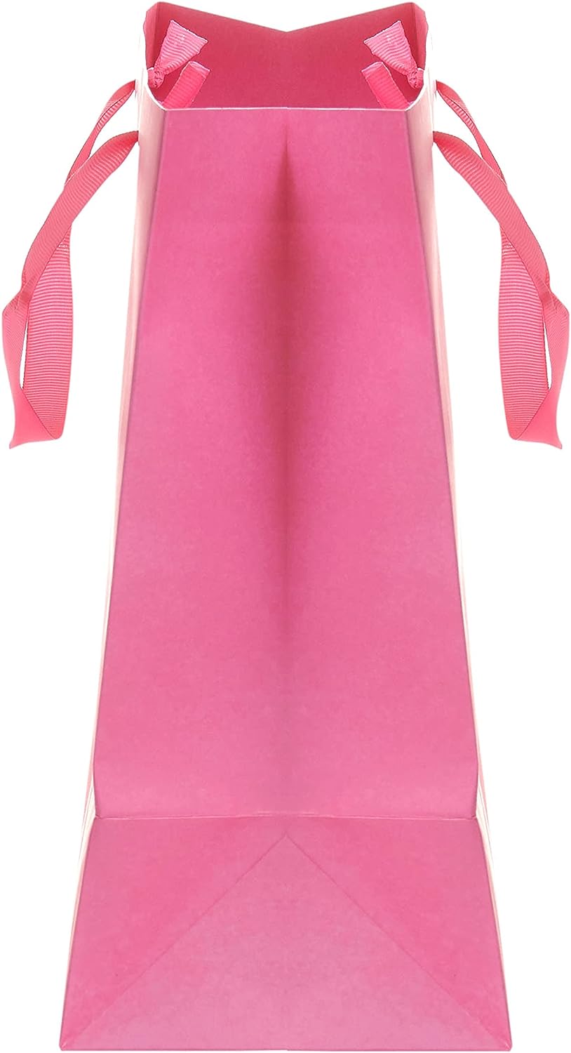 Bright pink large gift bag from UK Greetings, perfect for all occasions, with vibrant design and sturdy handles.