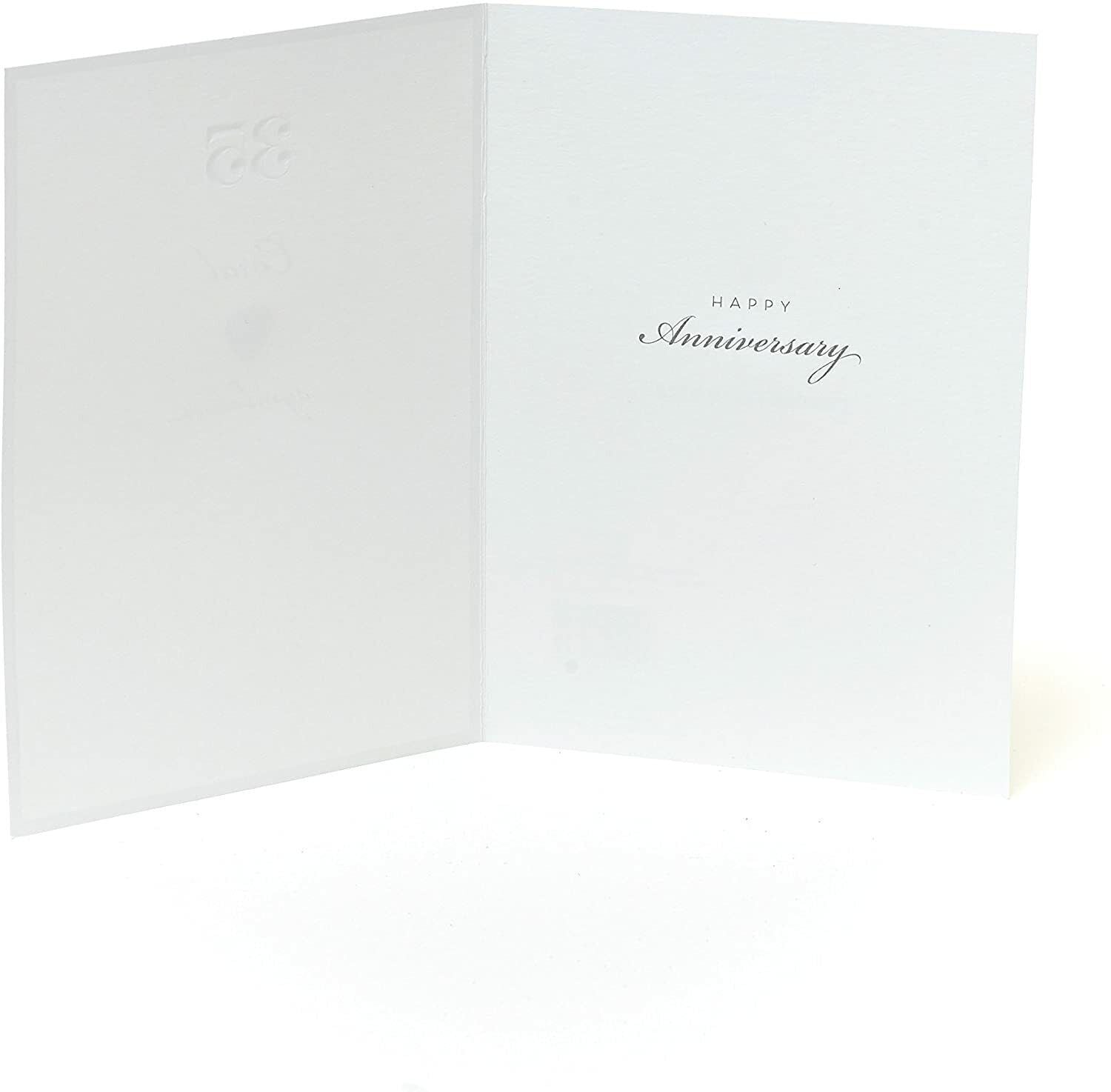 UK Greetings 35th wedding anniversary card with a coral heart design and heartfelt message on the front.