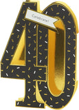 3D gold foil 40th birthday pop-up greeting card by UK Greetings with intricate design and festive decoration inside.
