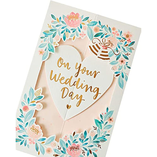 3D pop-up floral wedding heart greeting card by UK Greetings with intricate floral design and romantic heart shape.