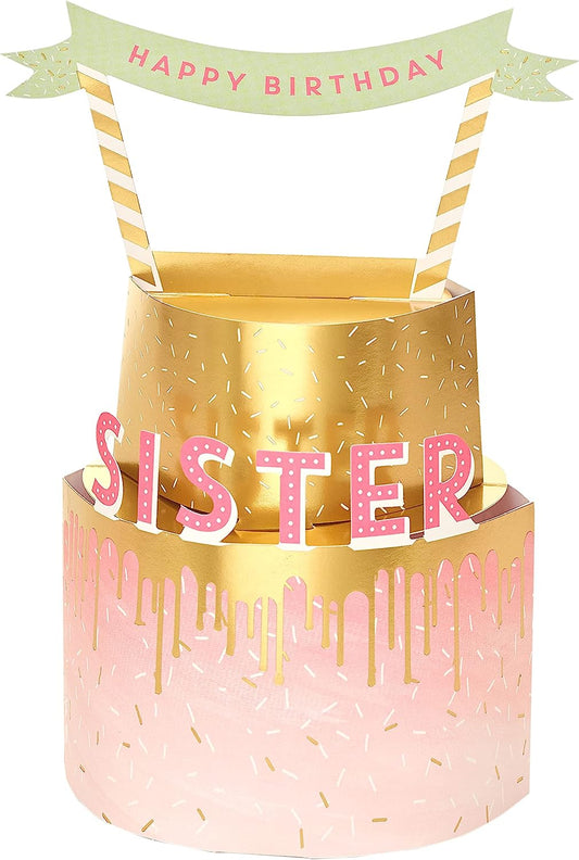 3D pop-up sister birthday greeting card with colorful floral design from UK Greetings, featuring a festive cake and decorative elements.