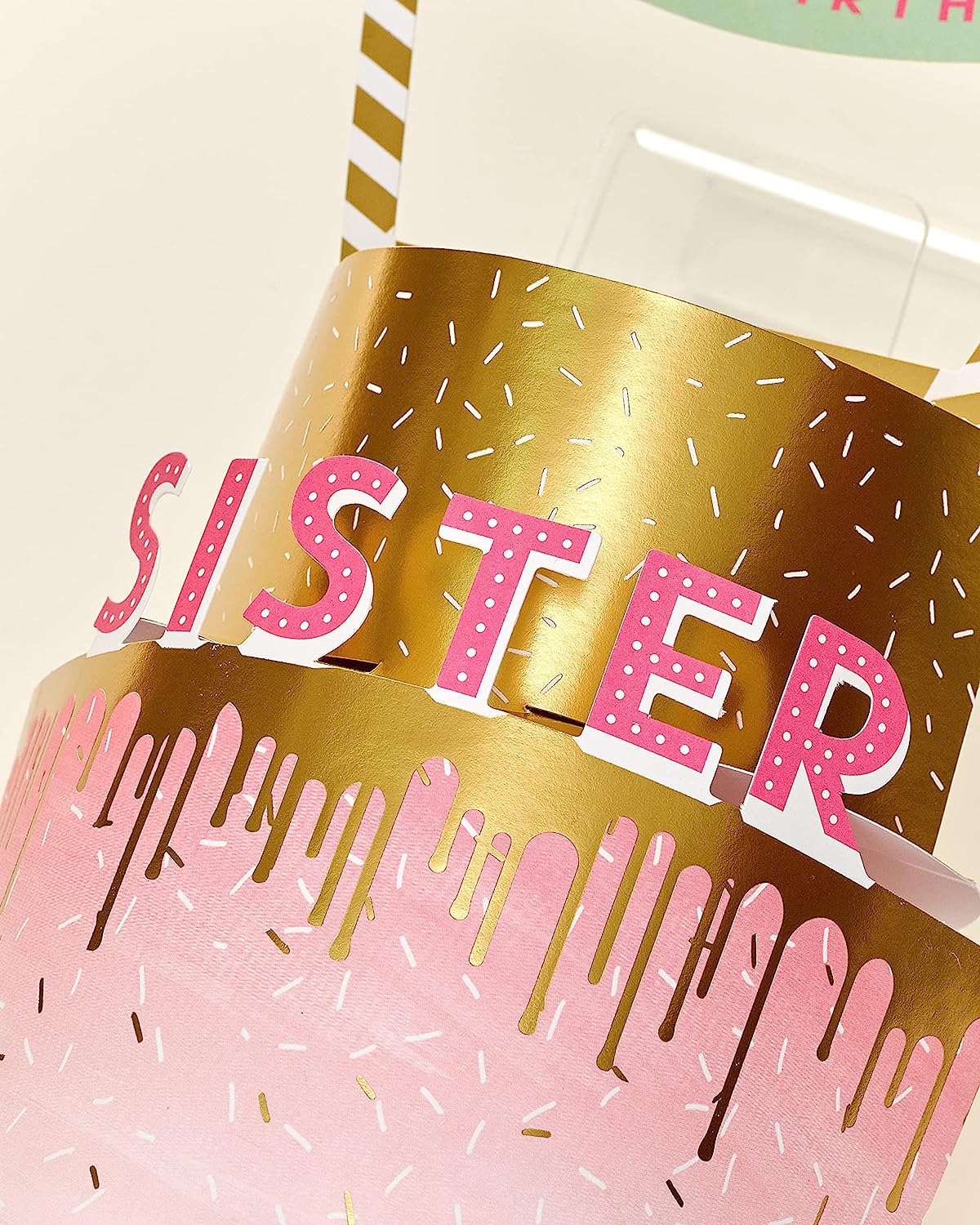 3D pop-up sister birthday greeting card by UK Greetings with colorful floral and heartfelt message design.