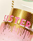 3D pop-up sister birthday greeting card by UK Greetings with colorful floral and heartfelt message design.