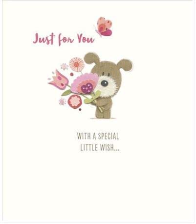 Greeting card featuring a colorful illustration of a pet grooming station with dogs, by UK Greetings.