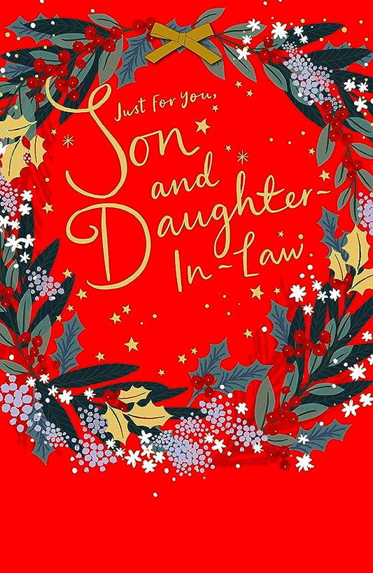 Festive greeting card from UK Greetings featuring a heartfelt message for son and daughter-in-law, with holiday-themed foil design.