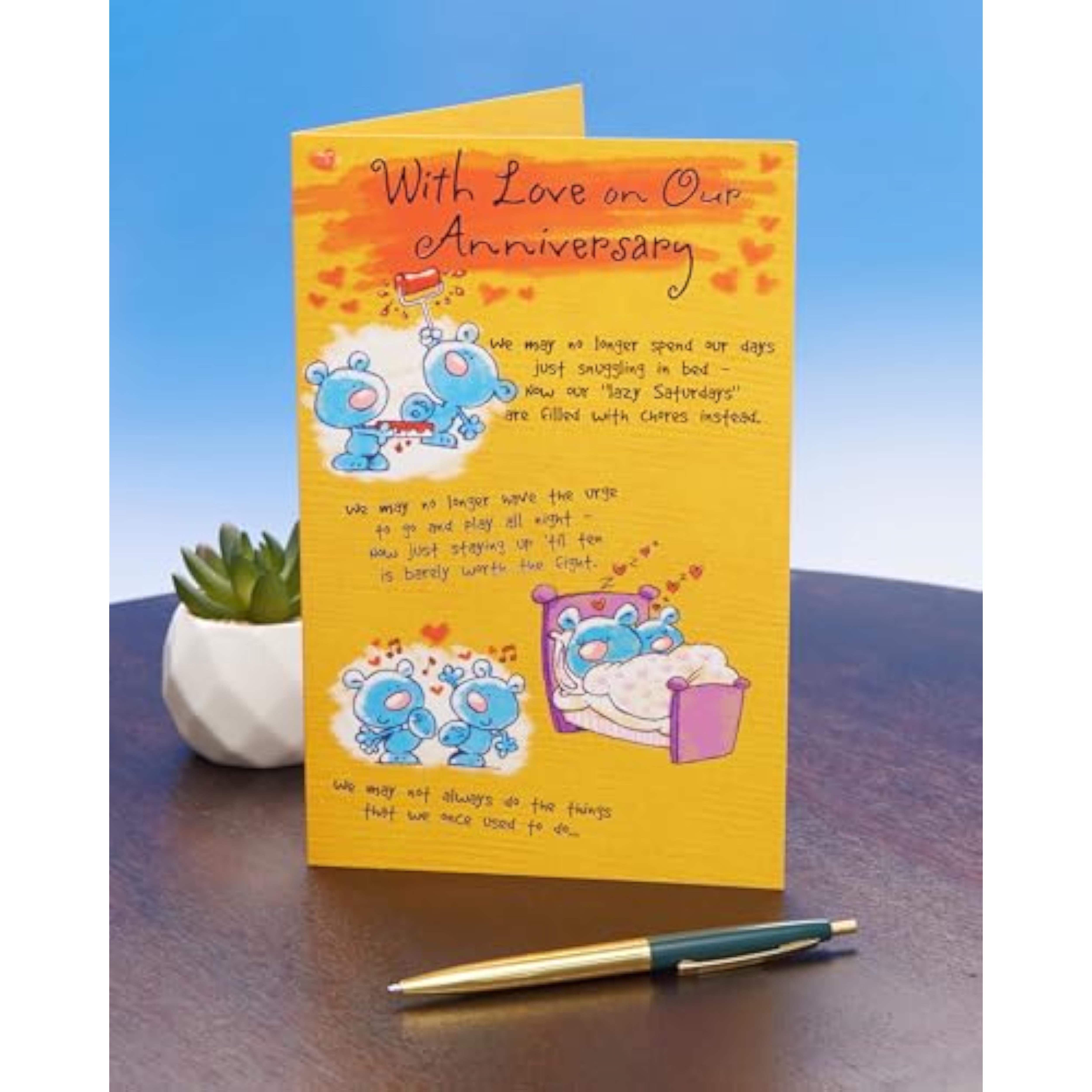 Pop-up anniversary greeting card for him and her featuring a heart design, by UK Greetings, with a surprise 3D heart inside.