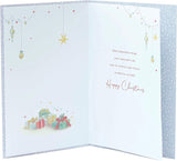 A UK Greetings Christmas greeting card featuring a traditional Christmas tree with elegant gold foil accents.