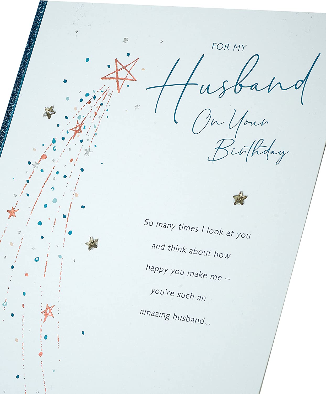 Loving birthday greeting card for husband featuring heartfelt words, UK Greetings brand, with colorful floral design on the front.