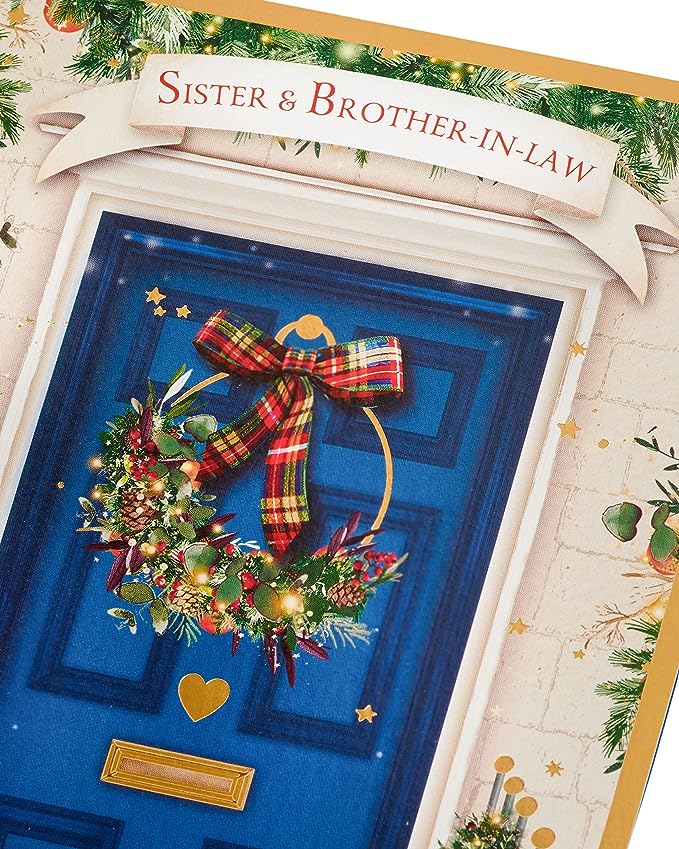 Blue door Christmas greeting card with gold foil design for sister and brother-in-law by UK Greetings.