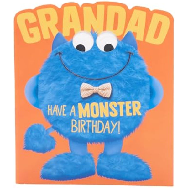 Blue googly-eyed monster greeting card for grandad's birthday, featuring playful monster illustration from UK Greetings.