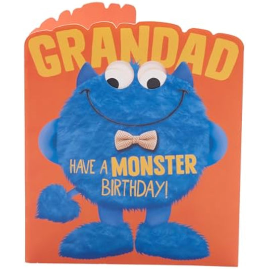 Blue googly-eyed monster greeting card for grandad birthday, playful design by UK Greetings, featuring colorful monster illustration.