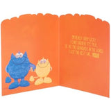 Blue googly-eyed monster greeting card for Grandad's birthday, featuring playful monster design and colorful artwork.