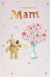 UK Greetings Boofle birthday greeting card for mom with envelope, featuring a lovely floral design and a vase of colorful flowers.