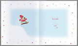 Christmas greeting card featuring Boofle snowboarding, designed for an amazing son, from UK Greetings.
